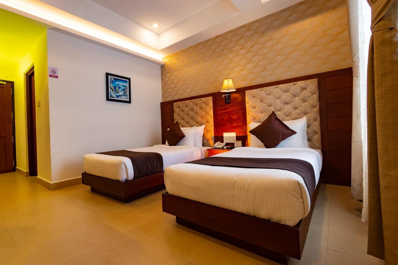 Готель Dev Residency Thiruvananthapuram Екстер'єр фото